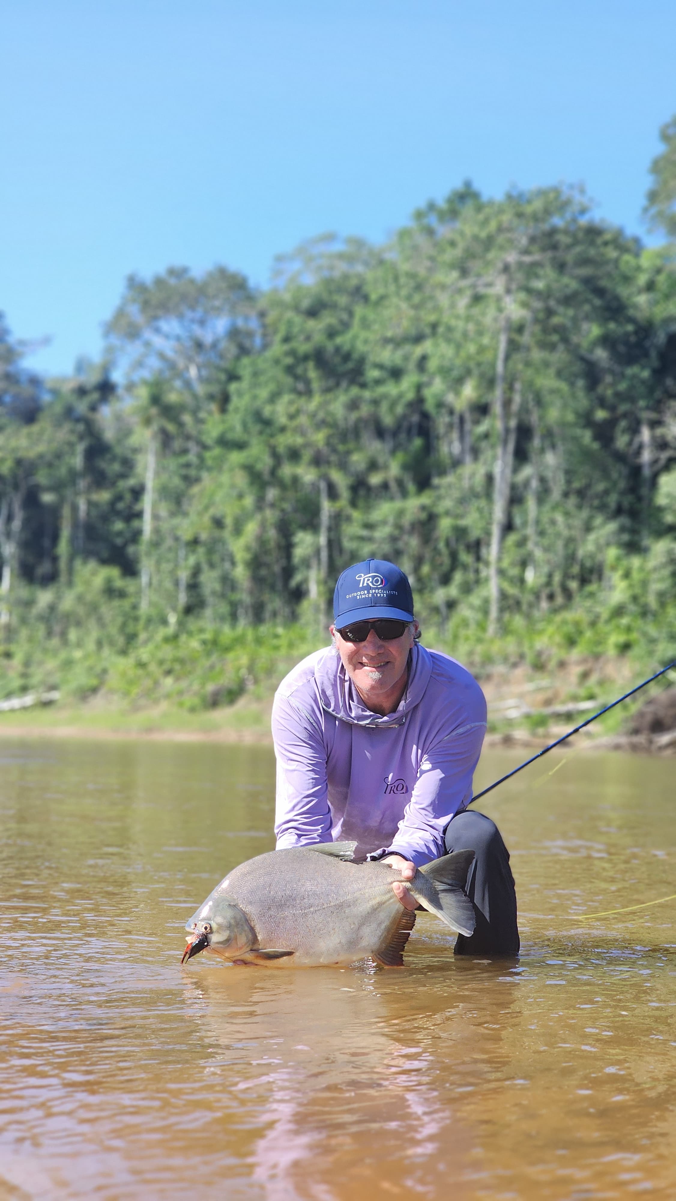 Mark with his first pacú, taken on a large dorado fly